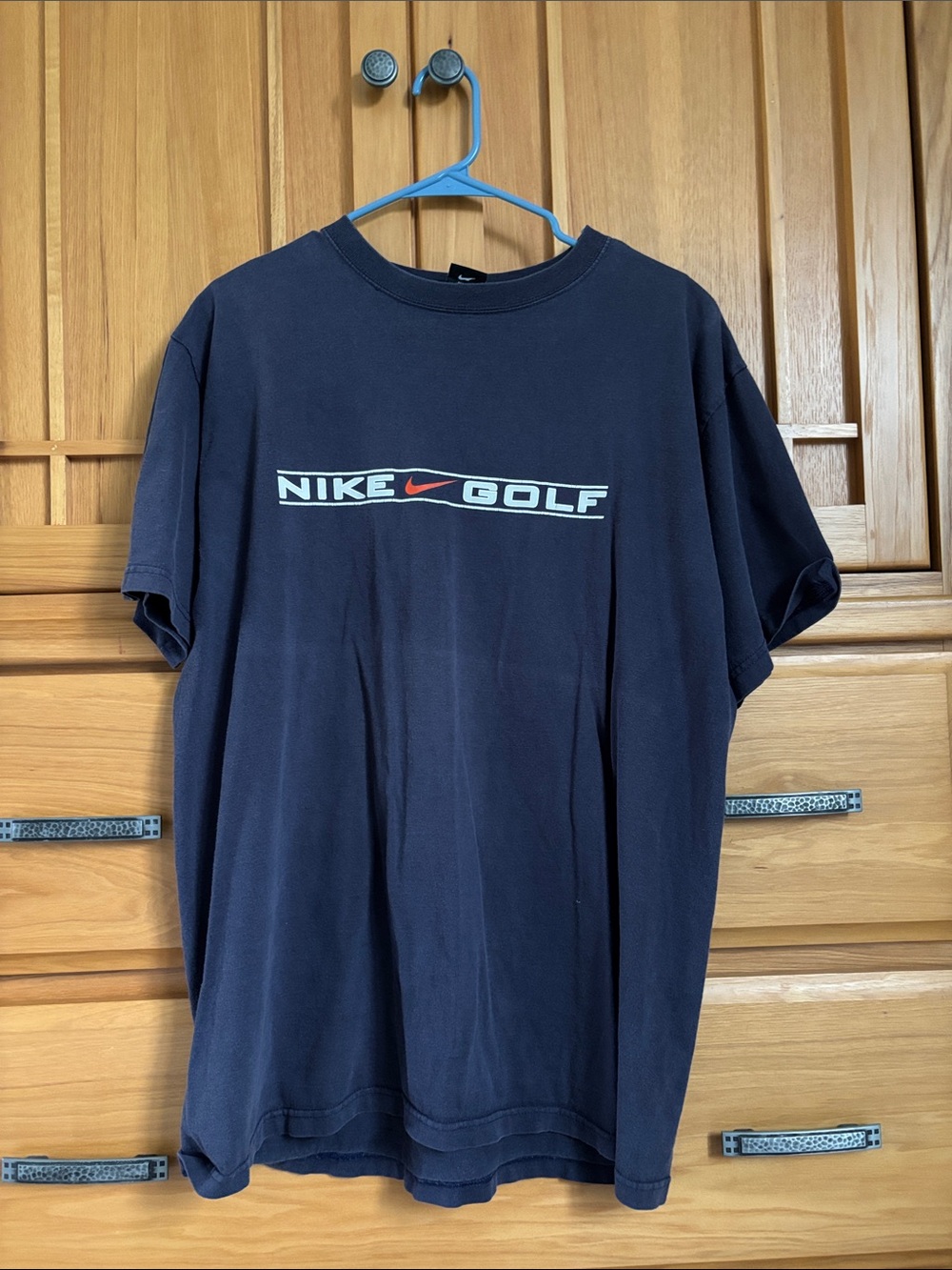 Nike Golf Black T-Shirt with Red Swoosh and White Logo